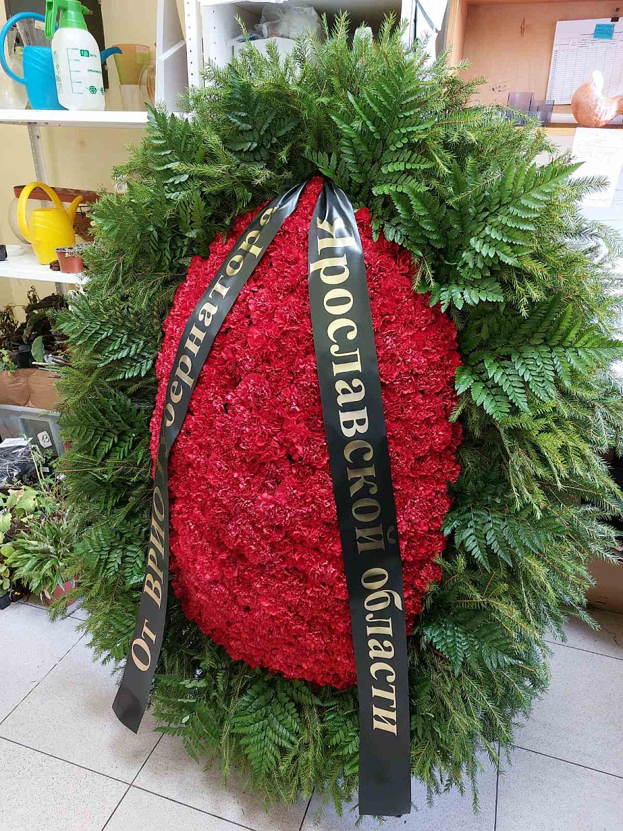 Венок ритуальный из гвоздик